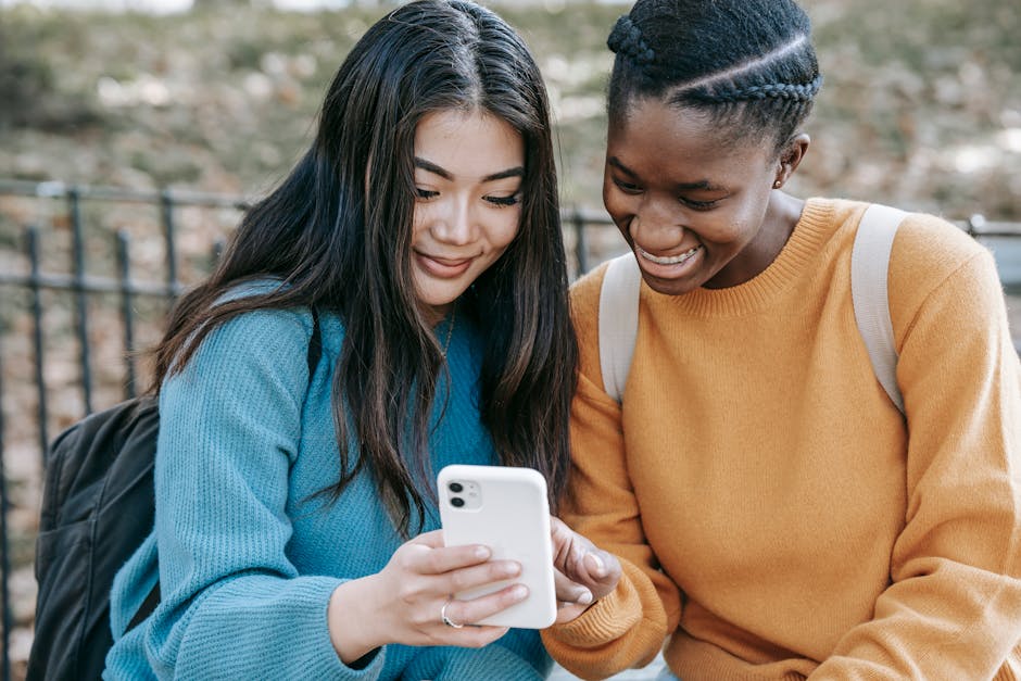 Student checking SIM-only deals on a smartphone