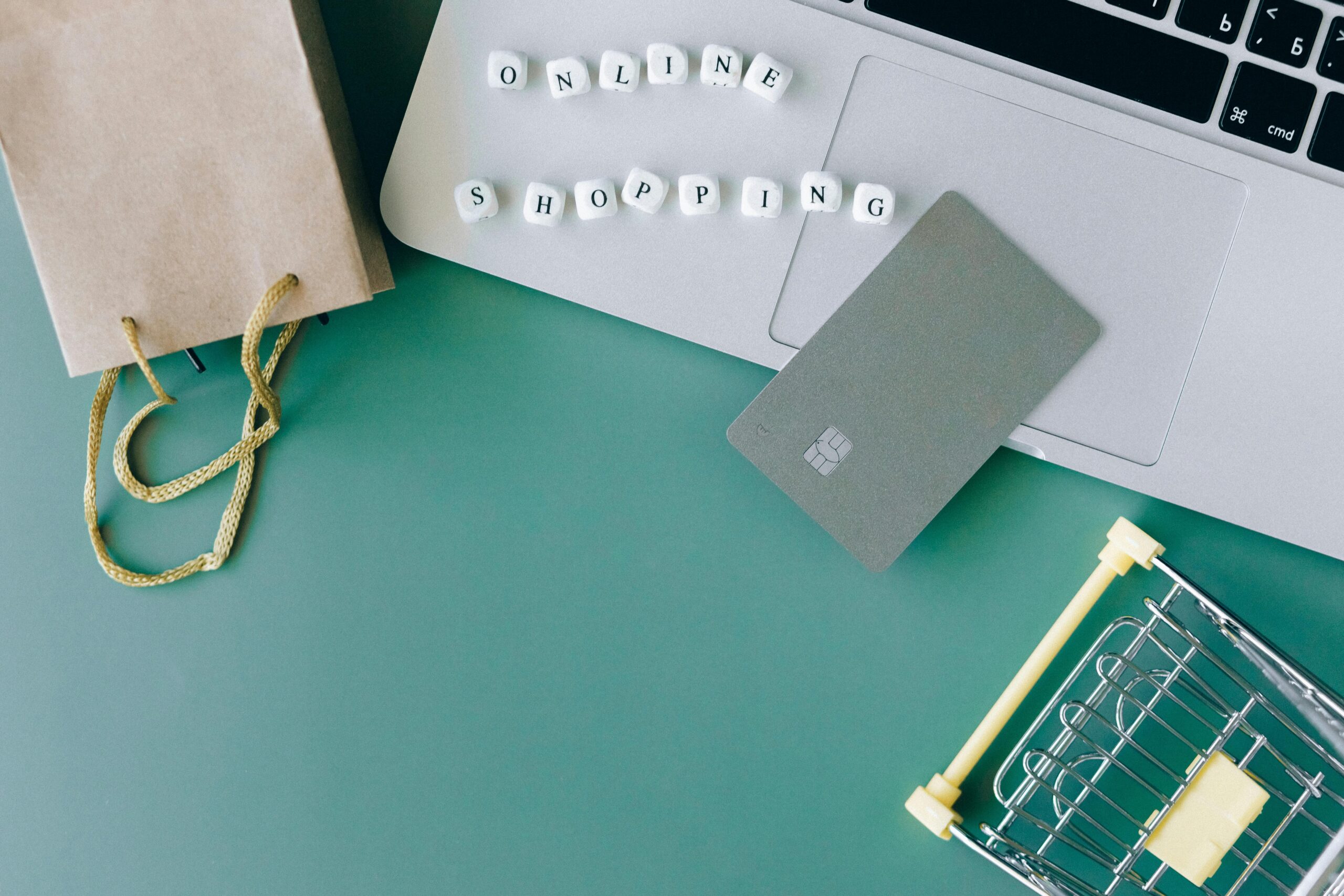 Online shopping with a credit card on a laptop screen