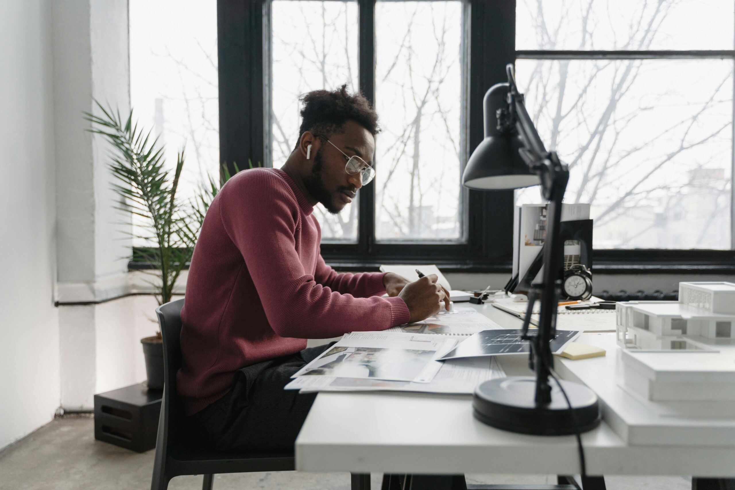 Young professional reviewing their pension options at work