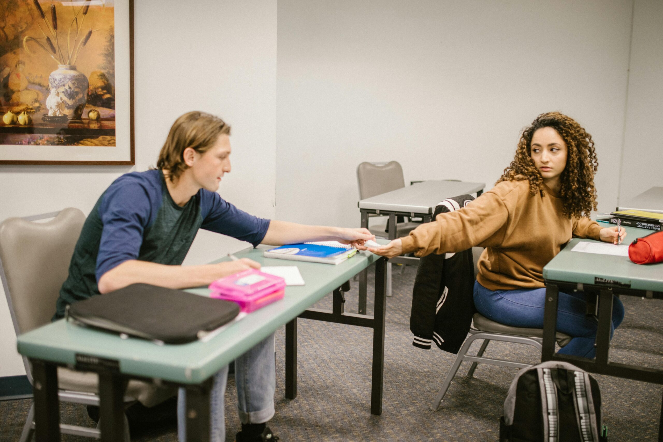 student reading a tenancy agreement document at a desk