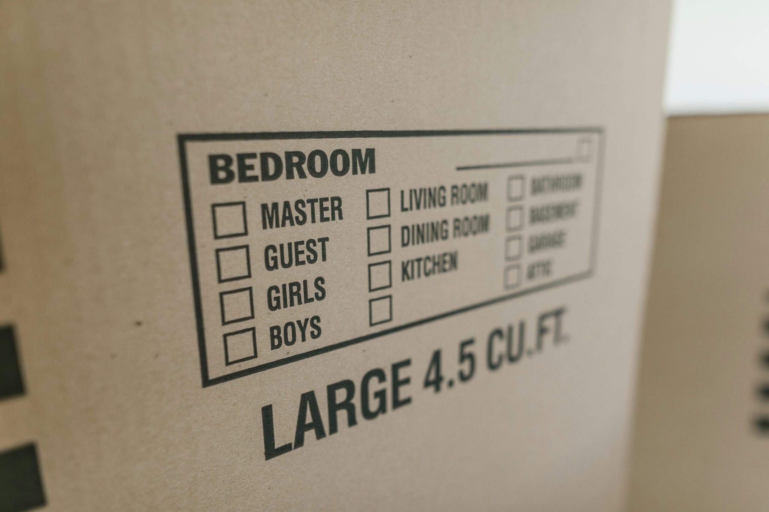 Packed boxes and luggage ready for a student moving into university halls