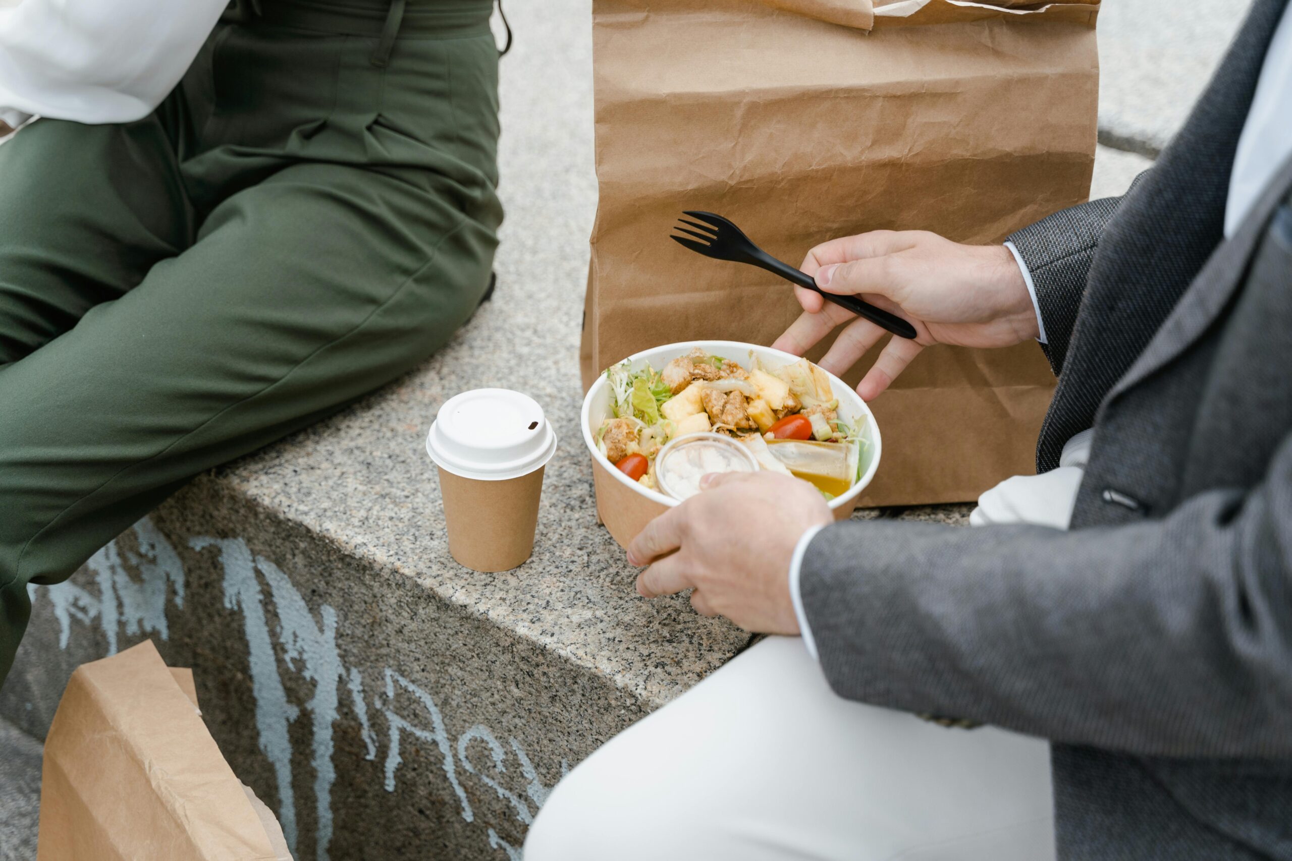 Student checking a food delivery app at home