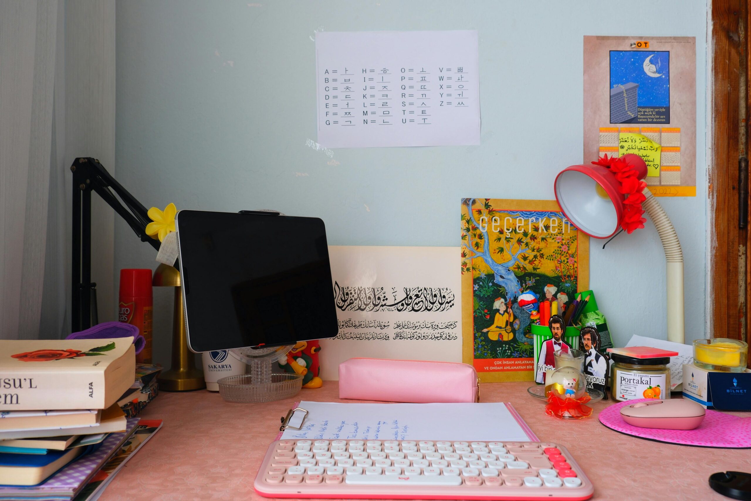 Tidy student bedroom with desk, lamp, and single bed ready for term