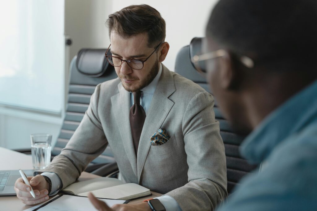 Graduate in meeting with hiring manager discussing terms