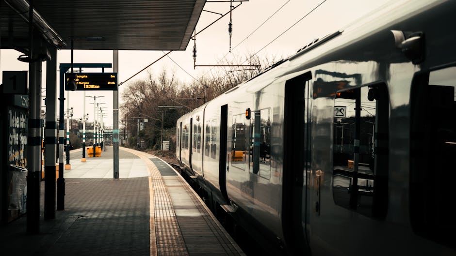 Train arriving at a London railway station platform