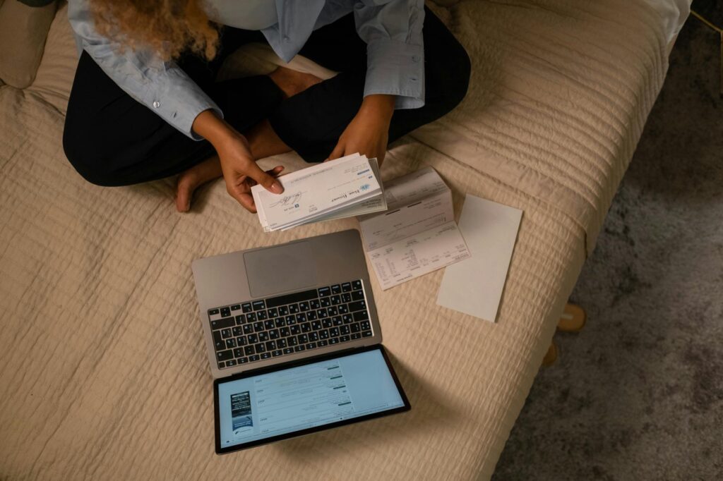 Student checking 2026/27 Student Finance England maintenance loan amount on laptop at home