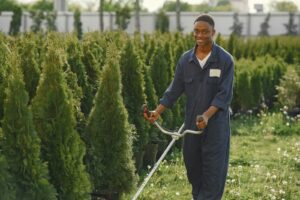 UK student carrying a backpack on the way to a summer job