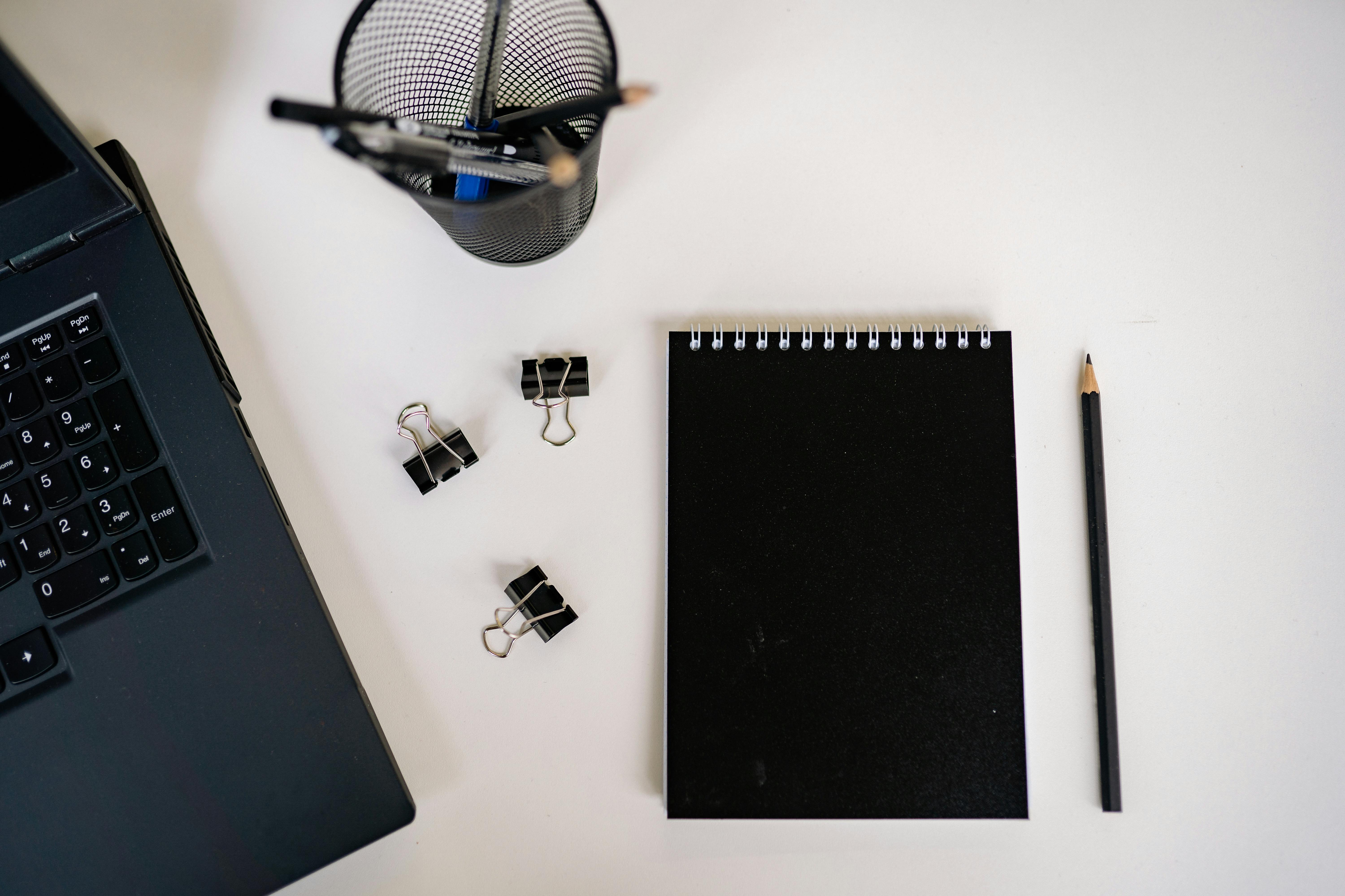 Graduate pairing CV templates with a cover letter draft on a laptop