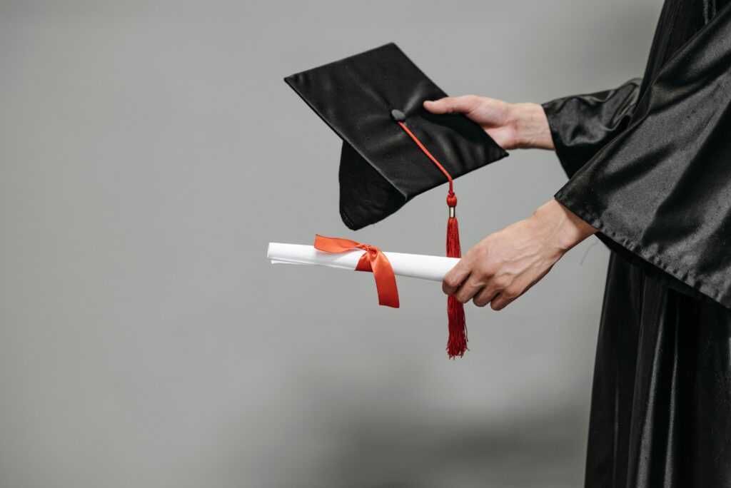 A UK graduate reviewing their payslip and tax deductions