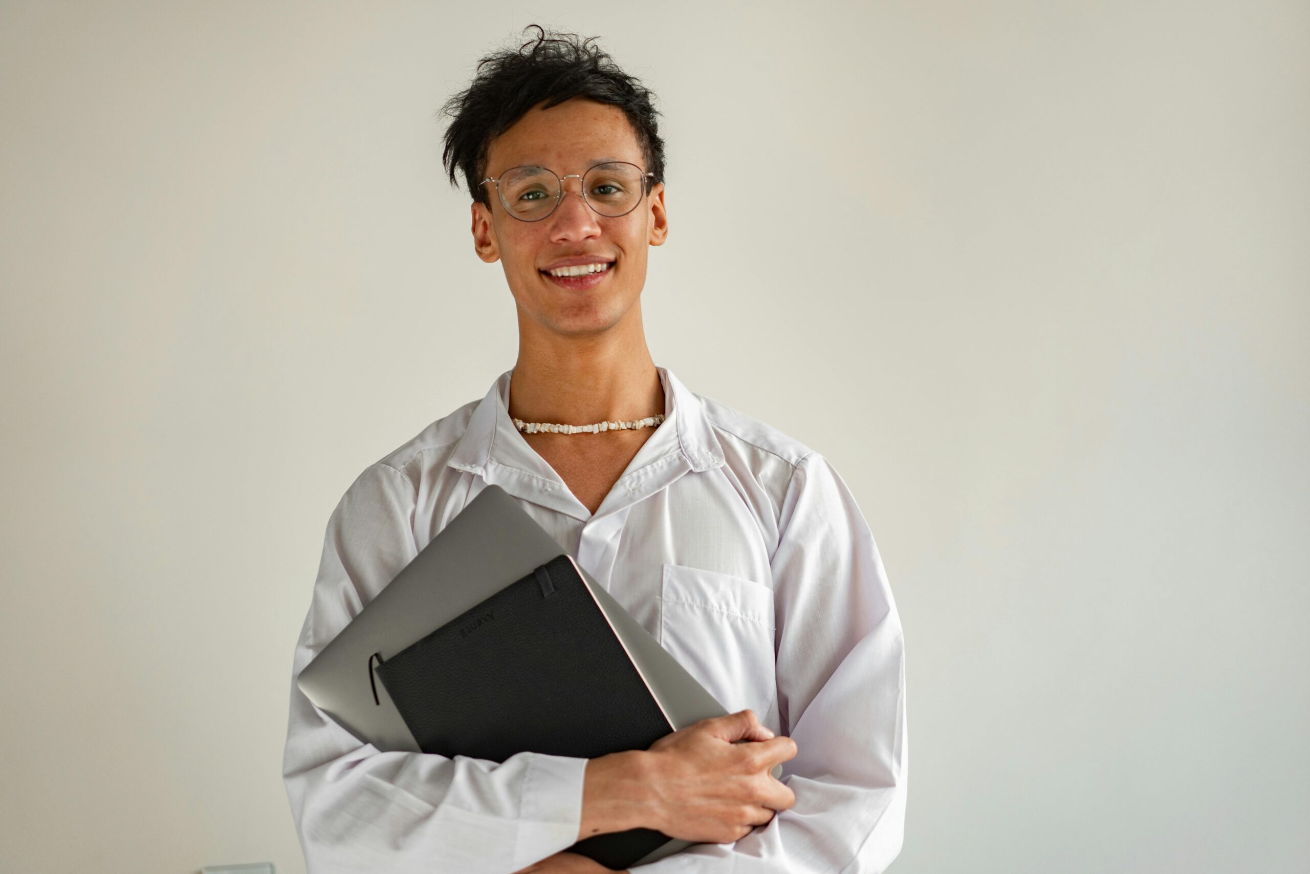 University student planning career options with graduate scheme brochures