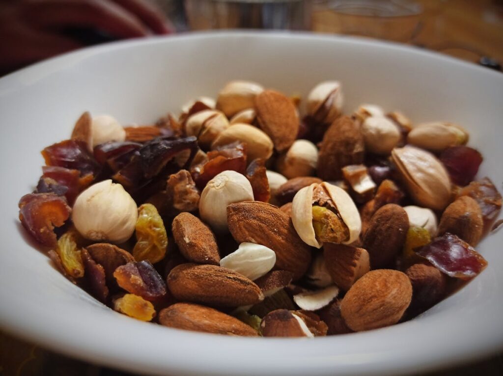 Mixed nuts and dried fruit in a bowl, affordable revision snacks