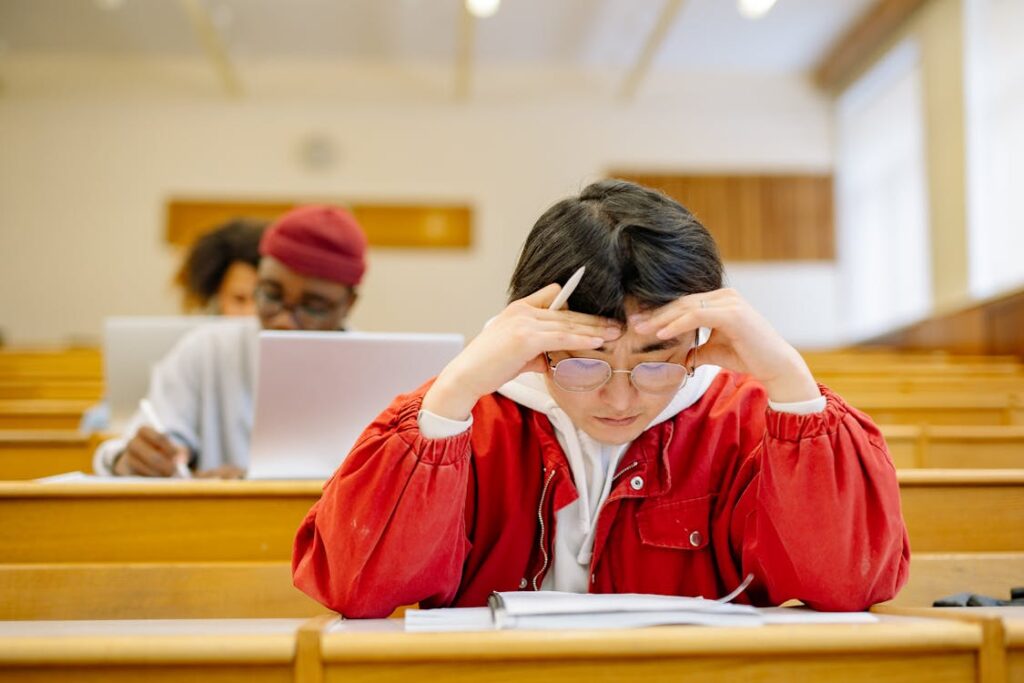Student taking a deep breathing break while studying