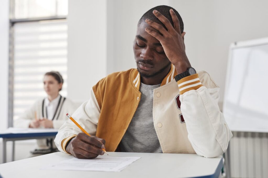 Student preparing for exams in university library