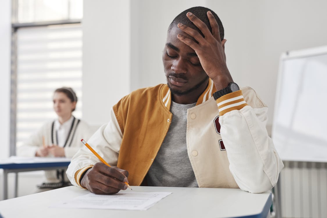 Student preparing for exams in university library