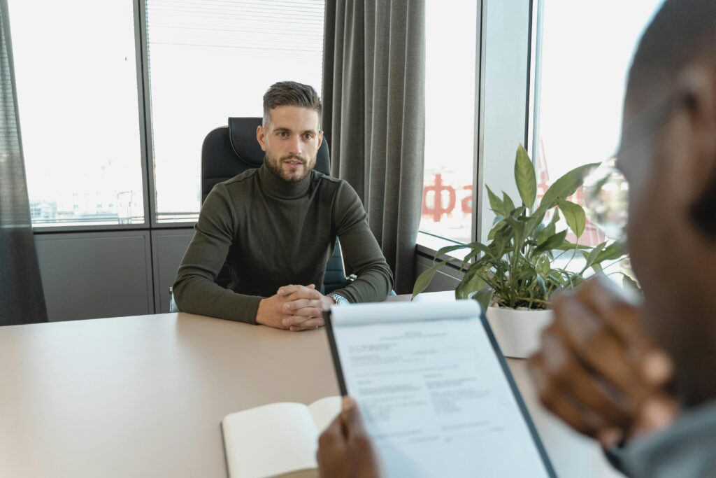 Professional candidate at a desk preparing applications