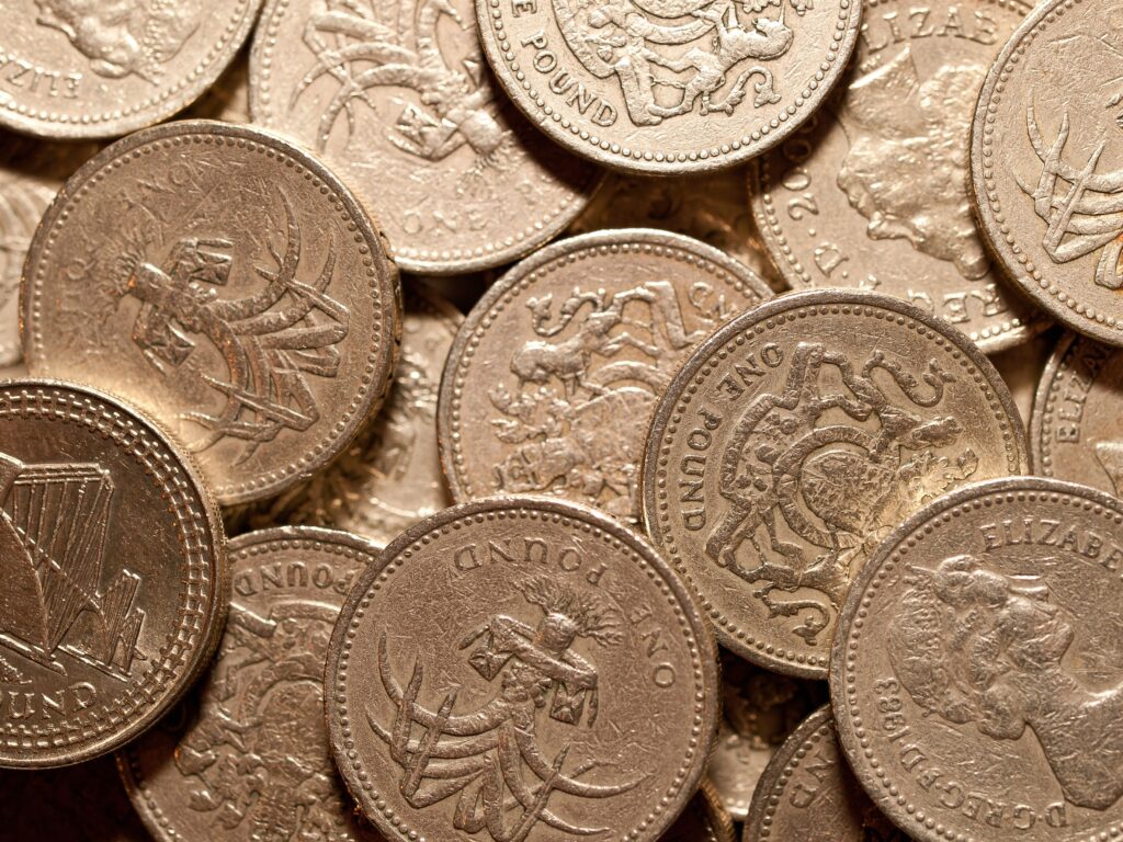 A pile of British one pound coins
