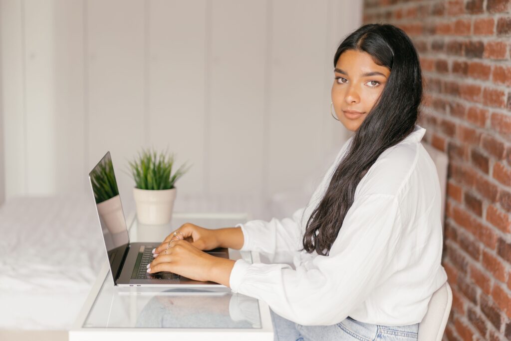 A student checking their student finance online account on a laptop