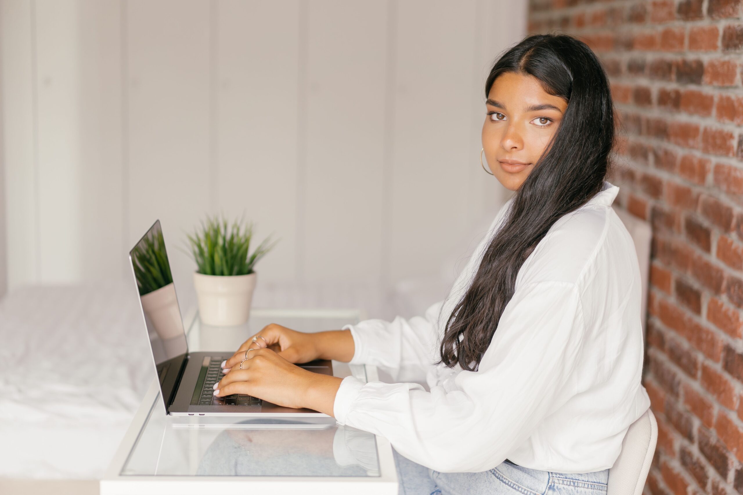 A student checking their student finance online account on a laptop