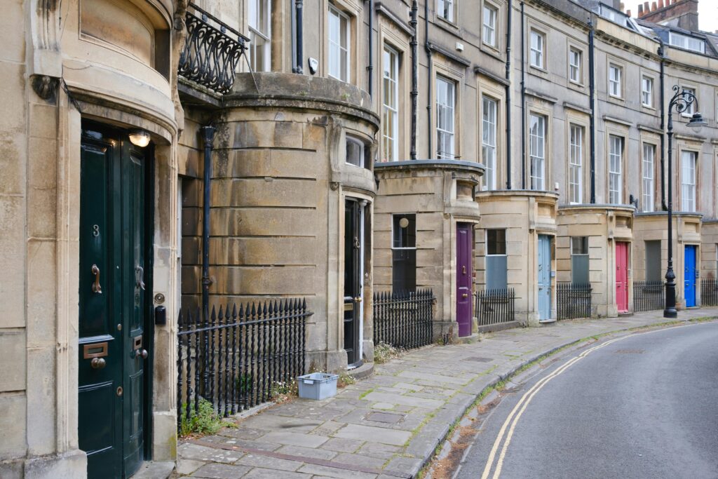Row of UK terraced student houses on a residential street