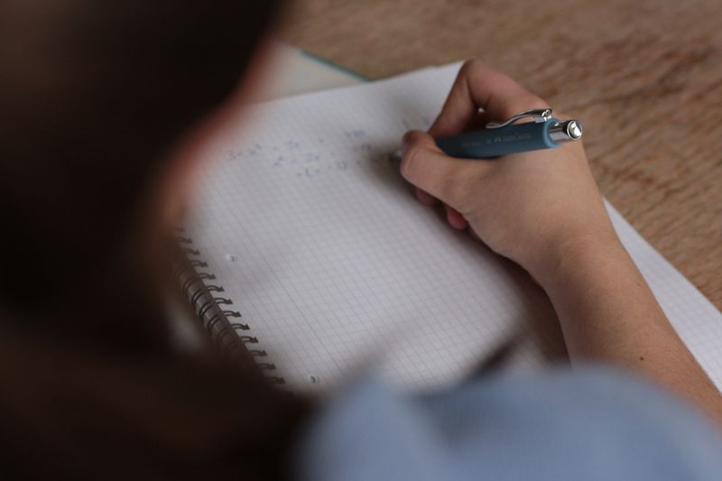 Working out a raw mark against the grade boundary in a notebook
