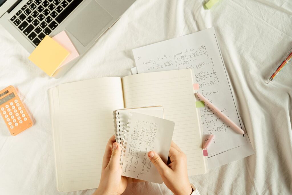Working out a raw mark against grade boundaries with a notebook and calculator