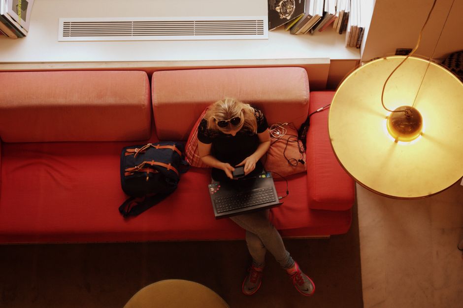 A student streaming on a laptop over home broadband