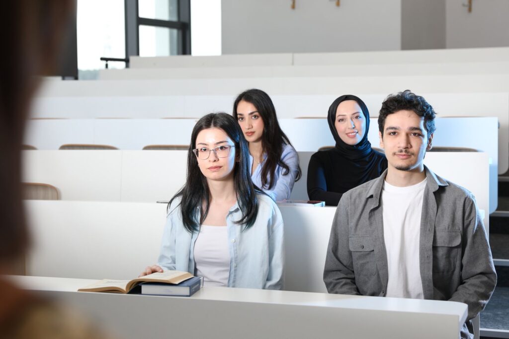 University students in a lecture hall after finding places in Clearing